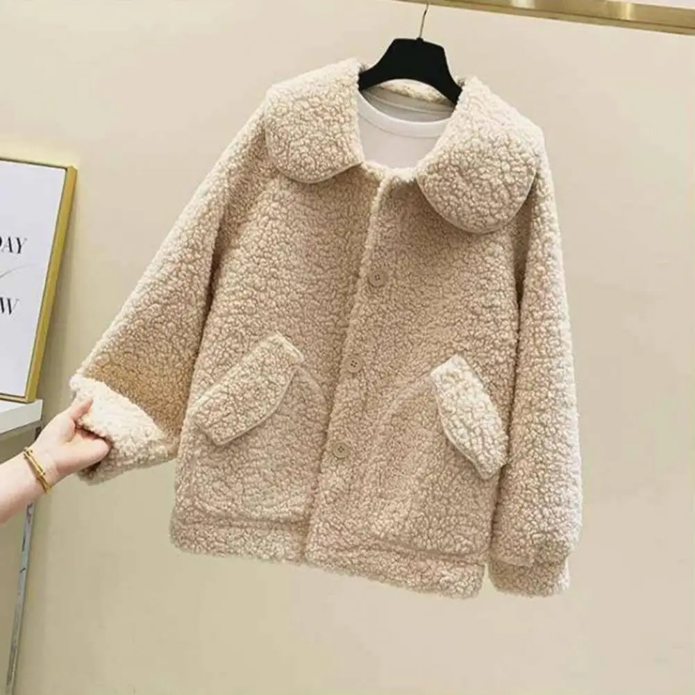 

Женская зимняя однотонная куртка с длинными рукавами и карманами