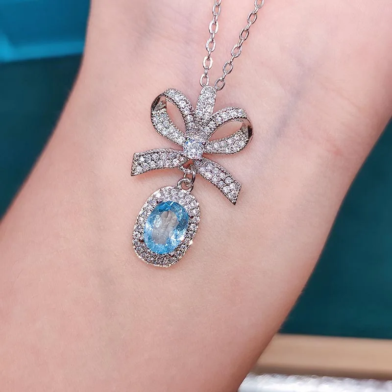 

Natural Sky Blue Zircon Pendant Necklace Silver Plated Bow Crystal Clavicle Chain Fashion Women's Exquisite Jewelry Gifts