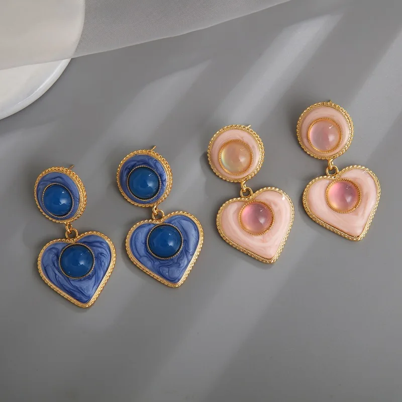 

2023 серьги-гвоздики в нишевом дизайне для женщин, высококачественные и характерные масляные серьги в форме сердца, оптовая продажа