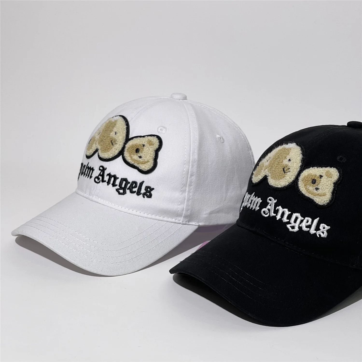 women couple fashionable casual caps 