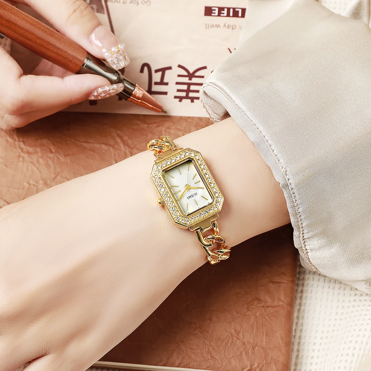 Ladies' high-value fashion bar scale square dial buckle shaped steel strip inlaid with diamonds outer shell quartz watch 4