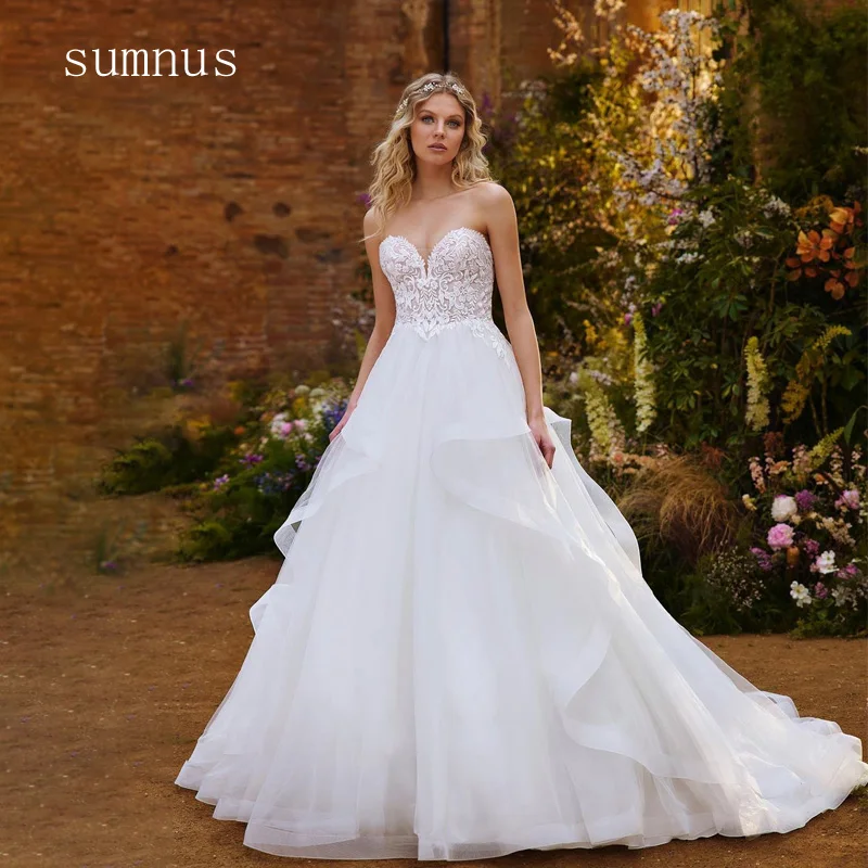 A-line Tulle Princess Wedding Dress Sweetheart Lace Appliques Button Sleeveless Elegant Bride Gown Court Train Wedding Gowns