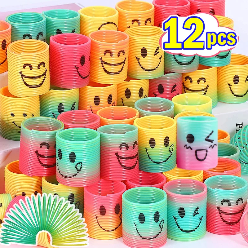 12PCS Children's Colorful Spring Ring Toys Mini Smiling Face Elastic Rainbow Ring Magic Toys Children's Birthday Party Gifts