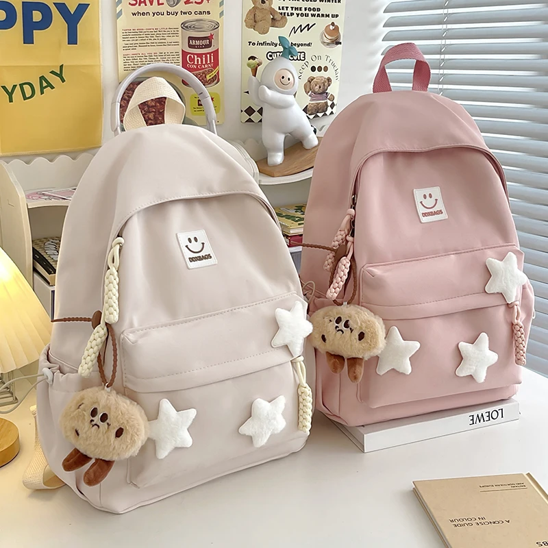 Cute Pink Backpack for Girls Fashionable Star Decorated School Bag with Plush Charm Ideal for Daily Use and School Cute Style Ba 3