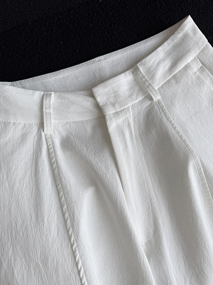 [EAM] High Waist White Pocket Brief Shaped Long Wide Leg Pants New Trousers Women Fashion Tide Spring Autumn 2026 1DJ0735