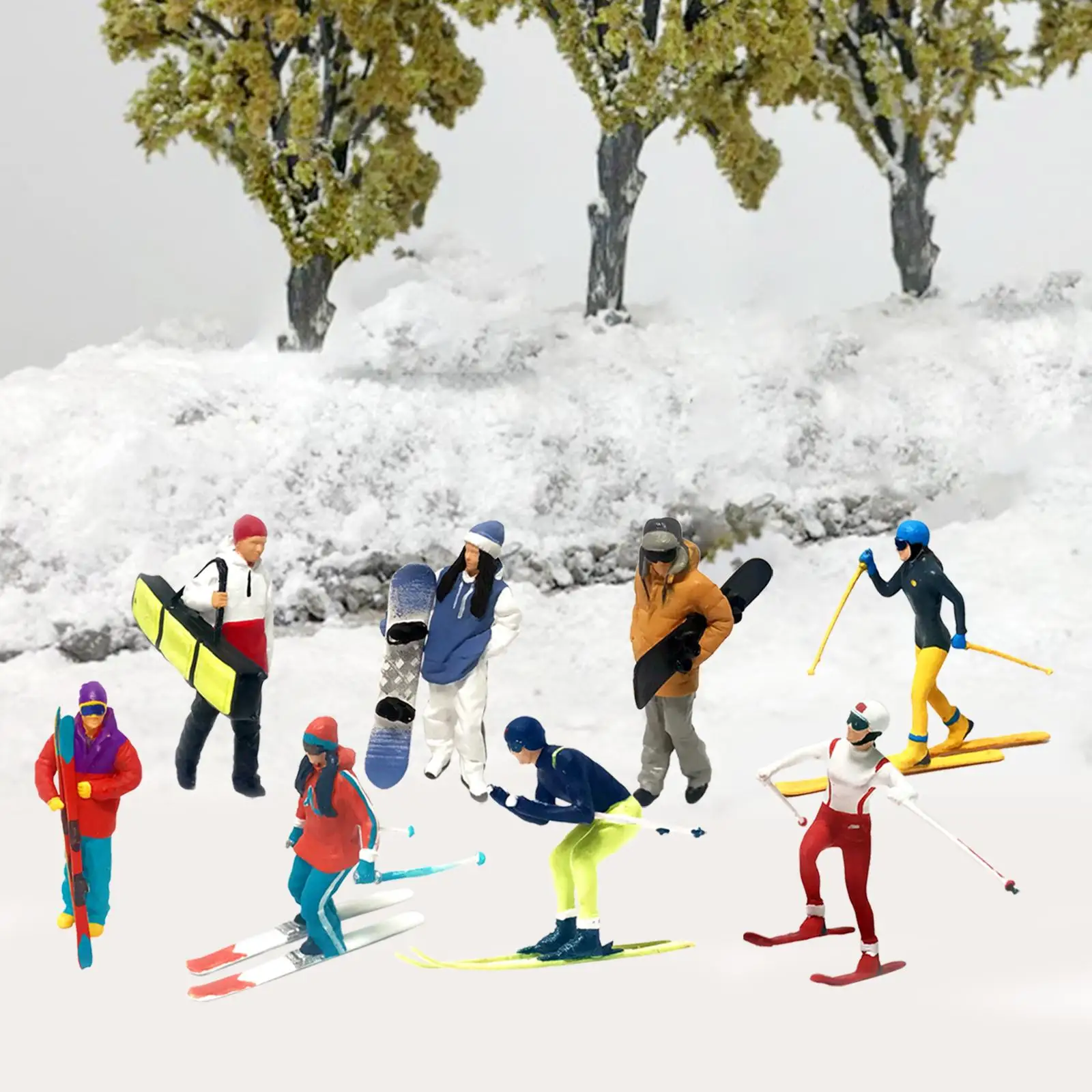 Miniature skiers in action - white background, copy space Stock Photo