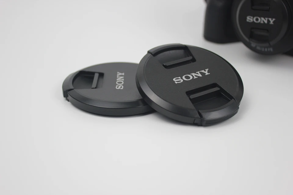 Description Picture 6 of itemHigh-quality second generation  40.5 49 52 55 58mm 62mm 67mm 72mm 77mm 82mm Center Pinch Snap-on Cap Cover For Iconic Brand Camera Lens