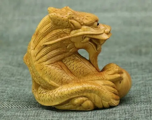 

CQ013ca - 10X9.5X6.2 CM Hand Carved Japanese Boxwood Carving Figurine : Dragon with Pearl