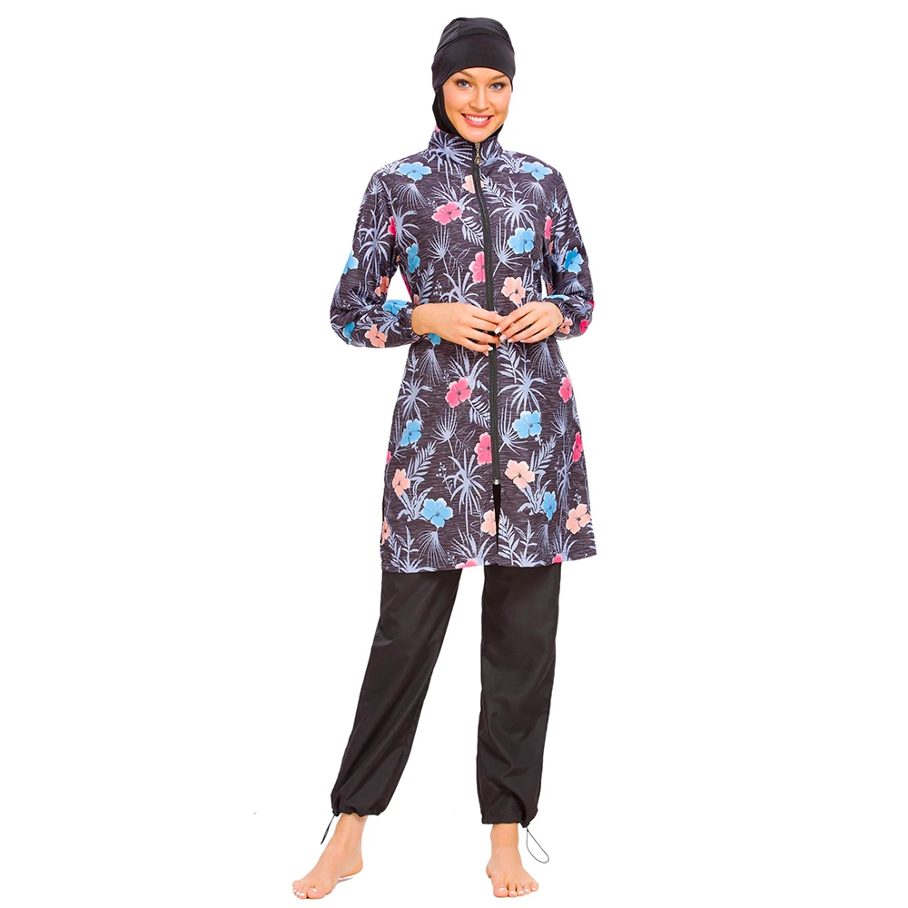 Loose-fit modest appareal swimwear with matching swim cap and leggings for full coverage.