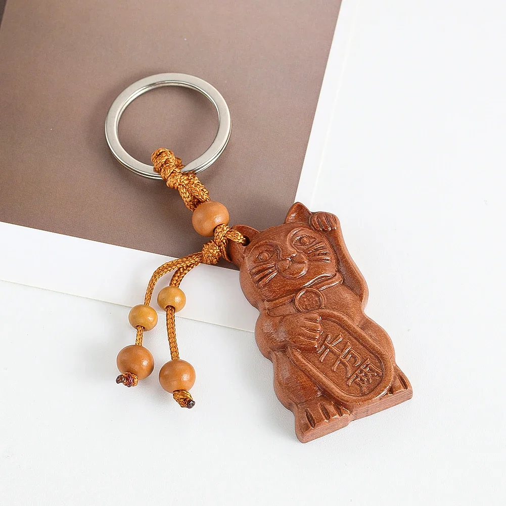 Maneki Neko Portachiavi Lucky Cat Mogano Laser Carving Cinese Old Peach Wood Pendant Fortune Charms Ciondola Hanging
