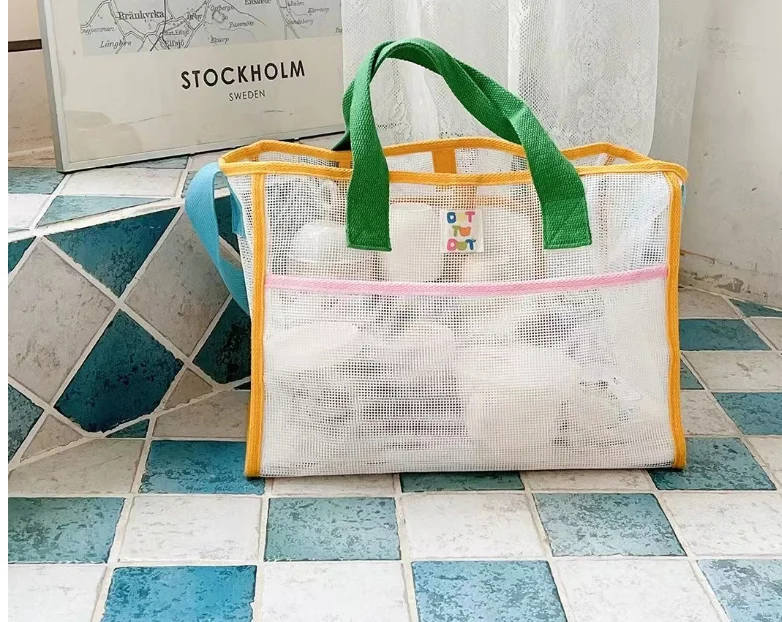 Description Picture 2 of itemTravel vacation color mesh large capacity mommy bag cross-body single shoulder storage bag