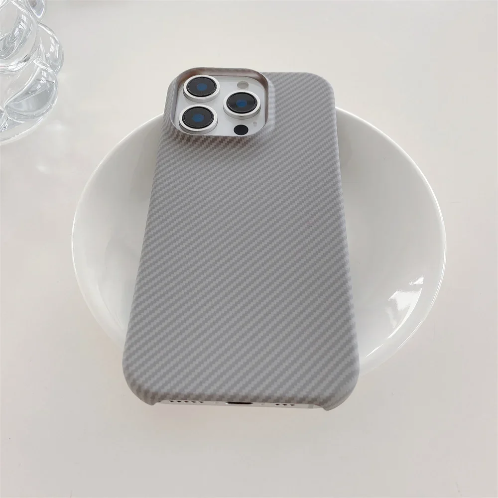 รูปสินค้า เคสโทรศัพท์ดีไซน์ล้ำ วัสดุเคฟลาร์ผสมหนังคาร์บอนไฟเบอร์
