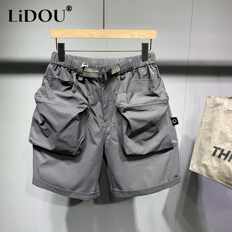 Summer New Solid Color Fashion Loose Knee Length Shorts Man Korean Style Elastic Waist Pockets Zipper Thin Style Straight Pants