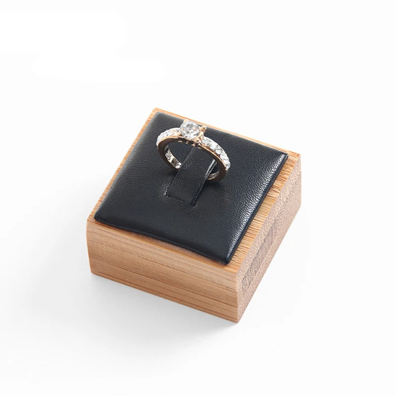 

Black PU Leather Bamboo Rings Displays Stand Creative Square Rings Holder Jewelry Display Stand 4x4x2.5cm