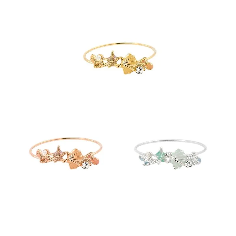 

Женское регулируемое кольцо с разноцветными ракушками и морскими звездами