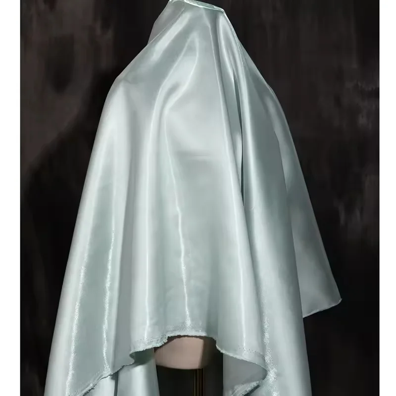 Blue Luxury Glossy Metallic Reflective Satin Fabric for Fashion and Formal Wear