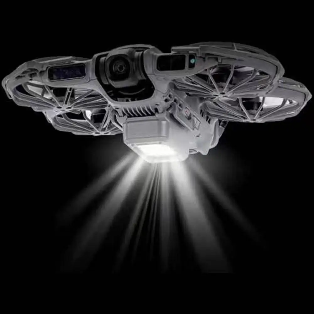 Trépied lumineux pour DJI NEO 2 en action, lumière clignotante renforçant la visibilité du drone en conditions de faible luminosité.