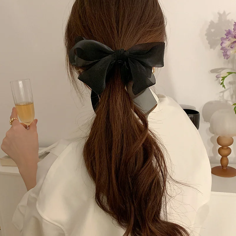 리본 보우 바나나 헤어 클립: 매력적인 머리카락을 위한 우아함과 실용성