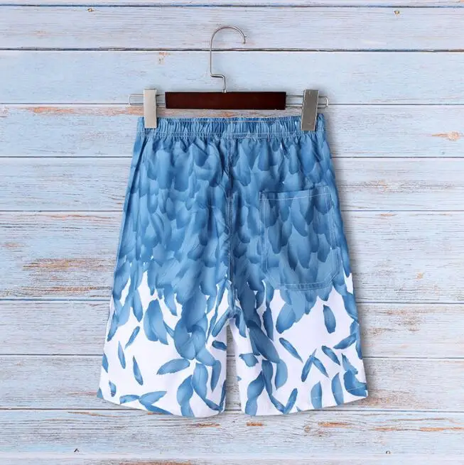

Beach pants men's large size quick-drying loose thin five-point men's shorts sports casual flower pants