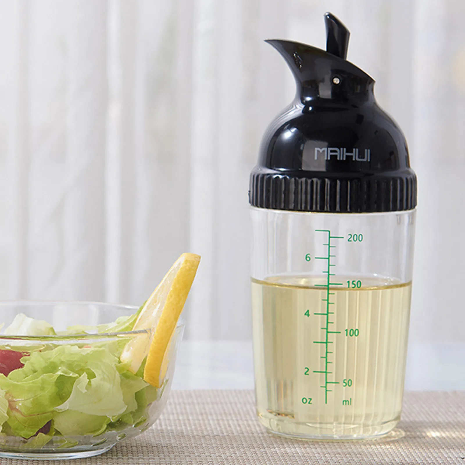 https://ae01.alicdn.com/kf/Sf9438104b4354121b8de8a855de75c25F/Hot-Sell-Easy-Grips-Salad-Dressing-Shaker-Dispenser-Leakproof-Container-Bottle-Universal-Sauces-Mixer-With-Scales.jpg