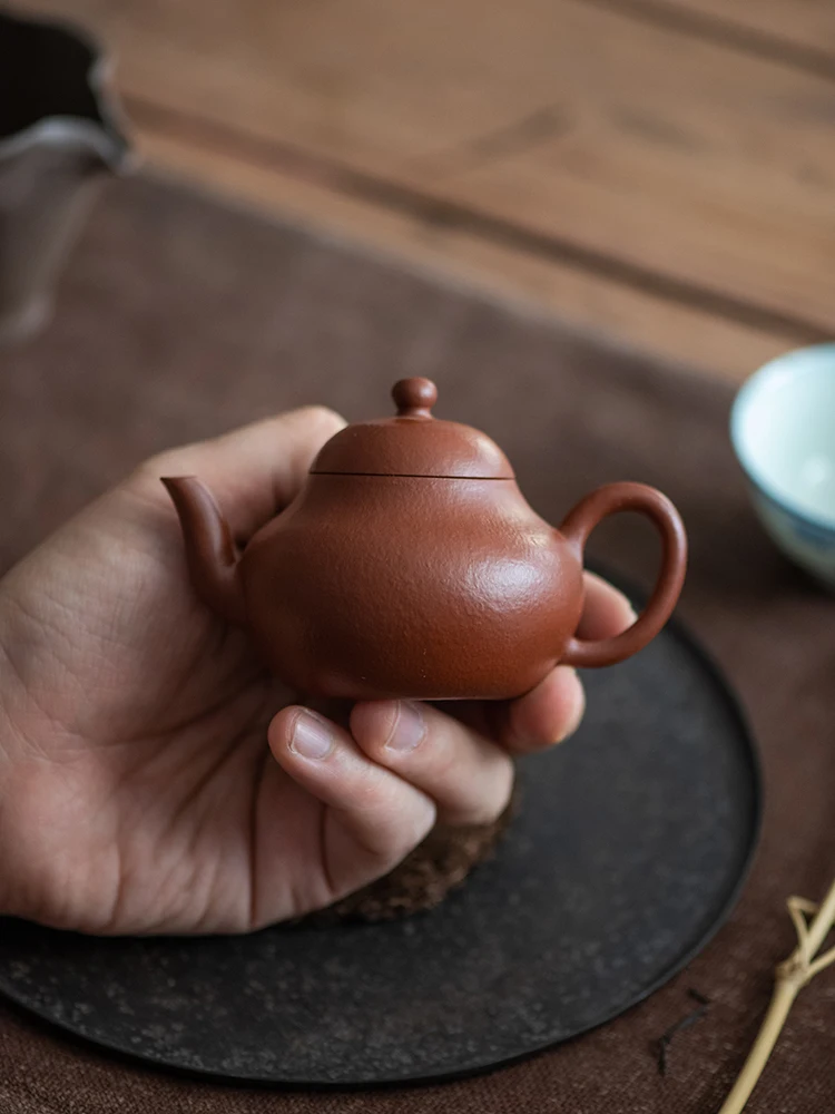 

Yixing фиолетовый глиняный горшок, чайный сервиз Xu Yuefeng Dahongpao грушевидная кожура, красная грязь, чистая ручная работа Meng Chen в форме