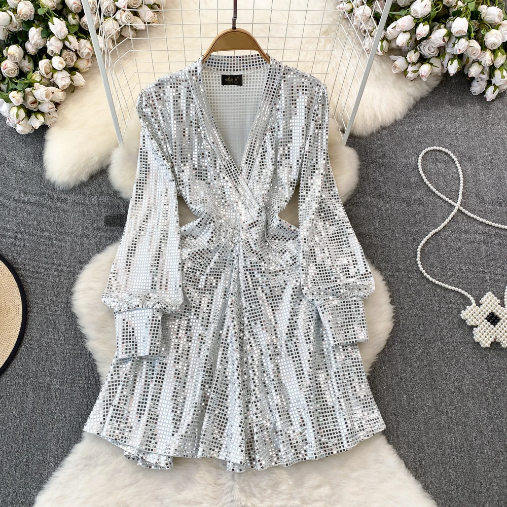 

Clothland Women Sexy Metal Color Sequined Dress Cross V Neck Back Sashes Long Sleeve Shiny Chic Mini Dresses Vestido QD376