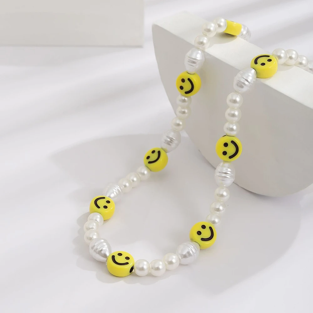 Set di gioielli con volto sorridente di perle - Istruzioni uso