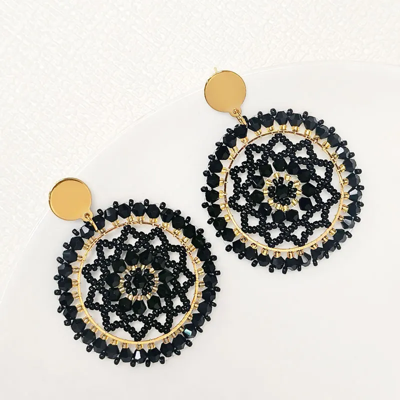 

Beaded earrings Crystal Roundness Sunflower Hollow out Originality Hand knitting Bohemia Alloy Tide Simple Rice bead earrings