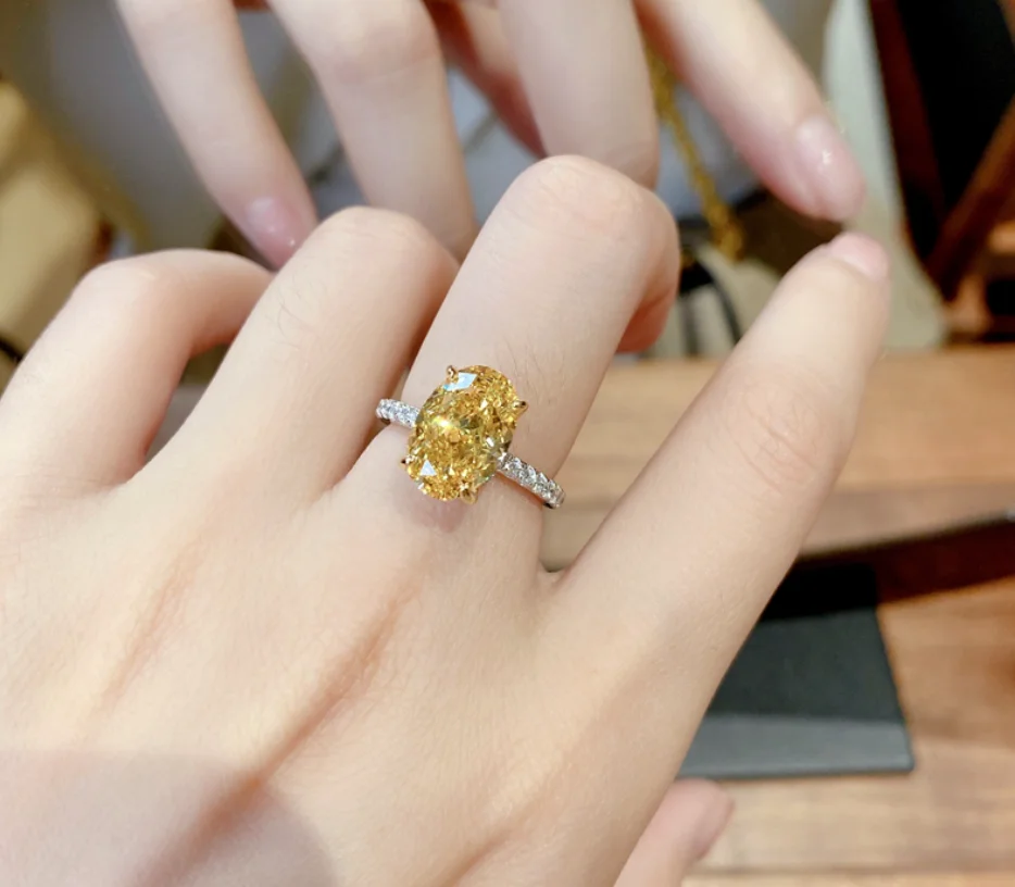 

Vintage goose luxurious yellow stone bright hand-made opening design rings for women fashion jewelry