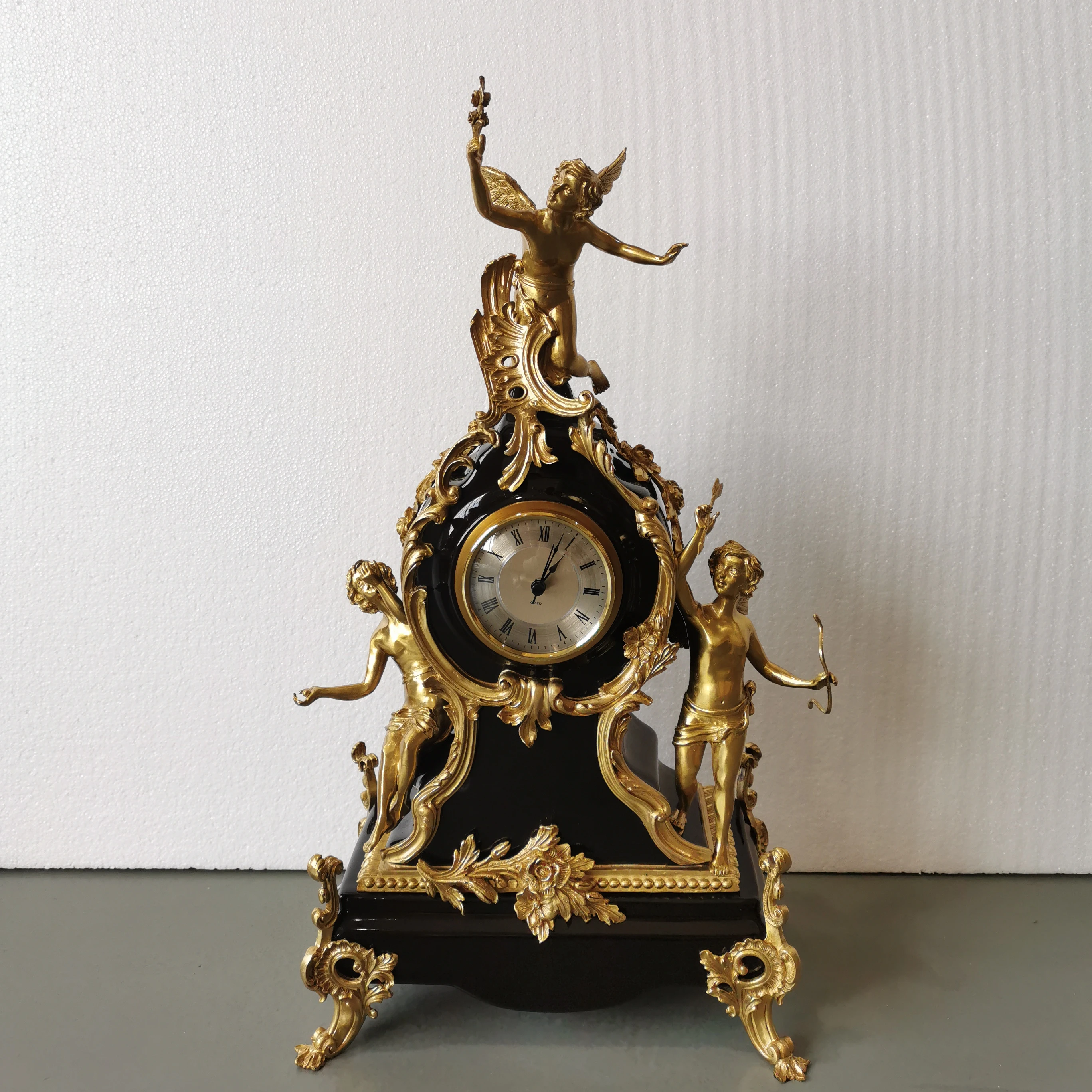 

ANTIQUE EMPIRE PENDULUM CLOCK IN GILDED BRONZE AND BLACK MARBLE