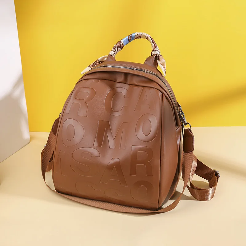 Fashion Letter Printed PU Leather Backpack Women's Large Capacity Bag Europe and The United States Wind Shopping Anti-shell Bag