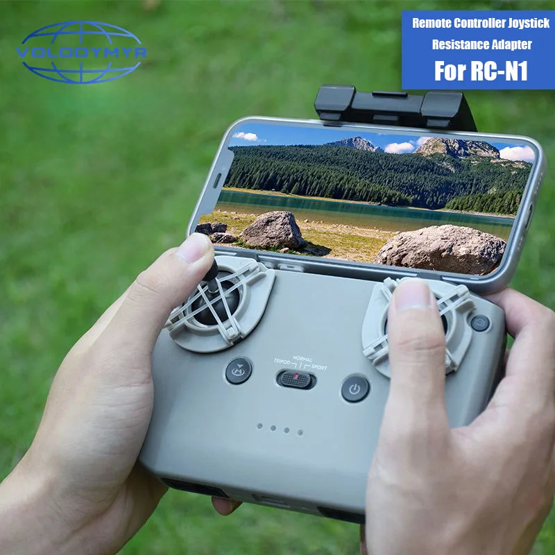 Vue de profil de l'amortisseur de commande ABS gris pour drone DJI, montrant son design ergonomique