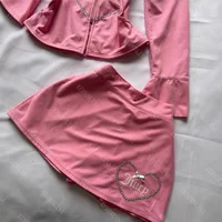 Street casual hip-hop cute versatile thin women's one-shoulder long-sleeved sports style fashion rock sweet bow mini slim skirt - Image 2