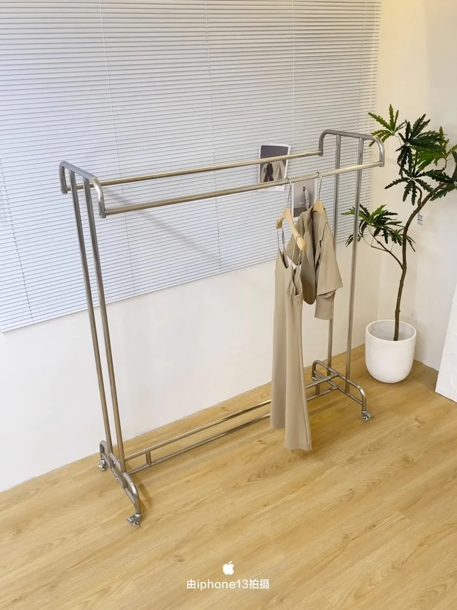 

Stainless steel children's and men's clothing store display rack, double row display rack, hanging rack, island rack, floor stan