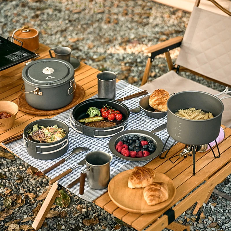 https://ae01.alicdn.com/kf/Sf9de871645b04dedb67ebf244de8cb68S/Naturehike-Aluminum-Alloy-Camping-Pot-Set-Portable-Outdoor-Camping-Kitchenware-Picnic-Cookware-Cutlery-Kettle-Frying-Pan.jpg