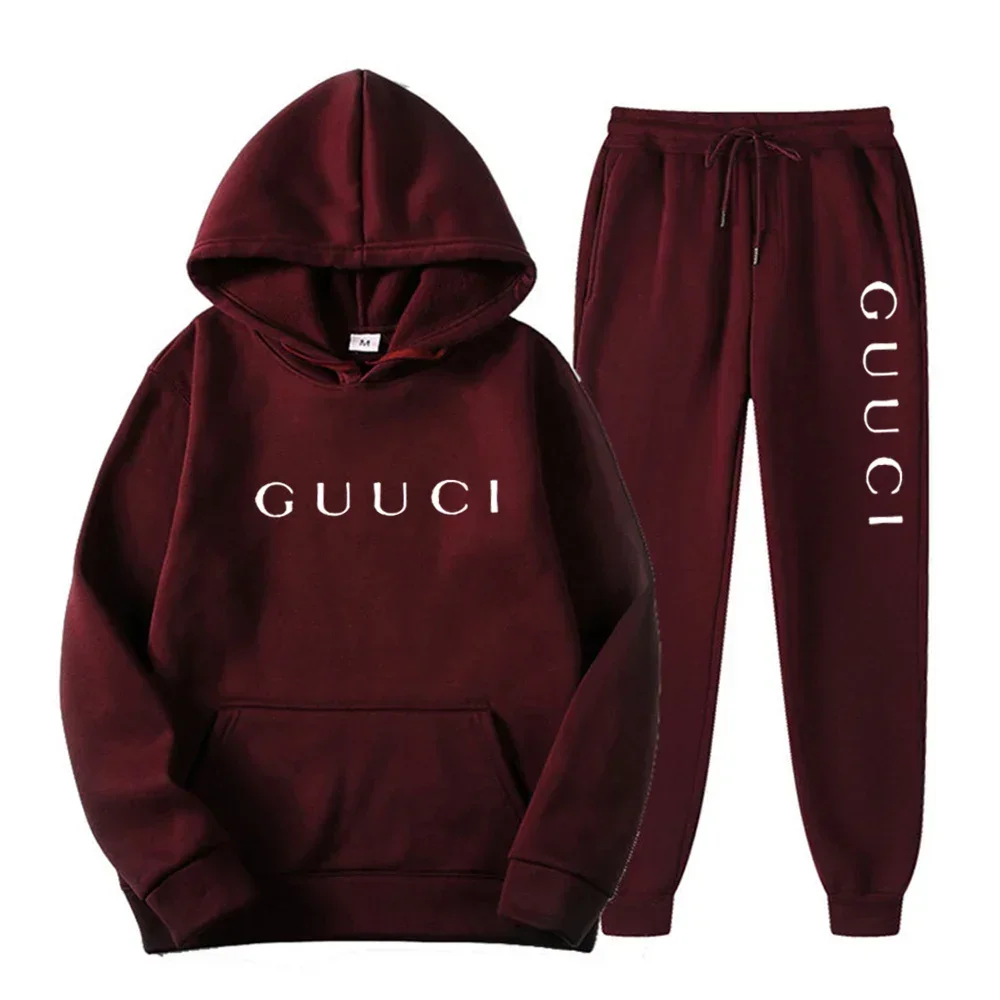 Man wearing autumn streetwear jogging set in urban outdoor setting dark wine