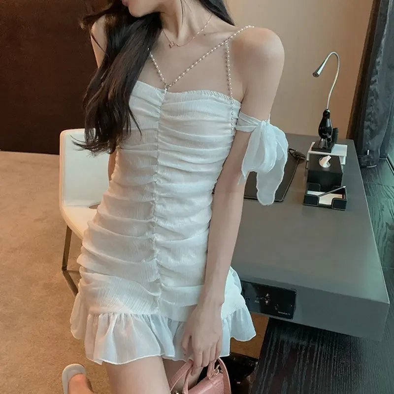 

Women's 2023 Sexy off-the-Shoulder Waist Fitted Figure Flattering Pearl Dress White Hot Girl Halter Skirt