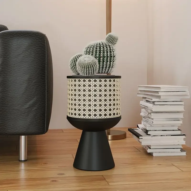 A Minimalist Iron Art Indoor Potted Plant Stand with A Mobile Design Resembling Rattan Weaving Desktop Flowerpot