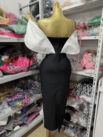 Robe femme sexy avec grandes épaules en blanc et taille cintrée avec un col en v, longue bandage dos nu et une robe longue pour 4