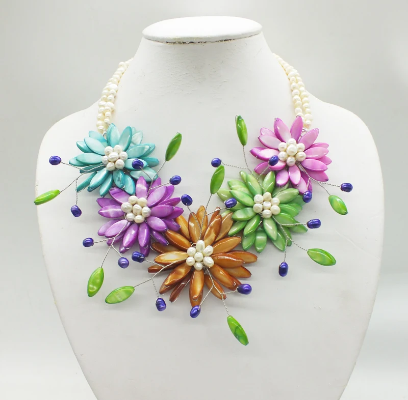 

Original design. Classic shells, pearls. Hand-woven flower necklace. charming. extremely female decorative 20"