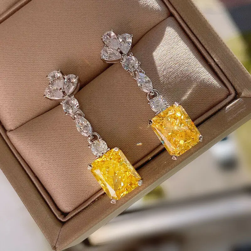 Boucles d’oreilles élégantes pendantes avec zircone colorée main image 1