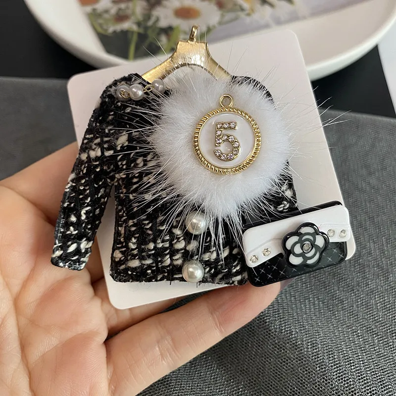 New number 5 black white fabric mink hair brooch creative plush clothes bag pearl corsage brooch coat accessories for women