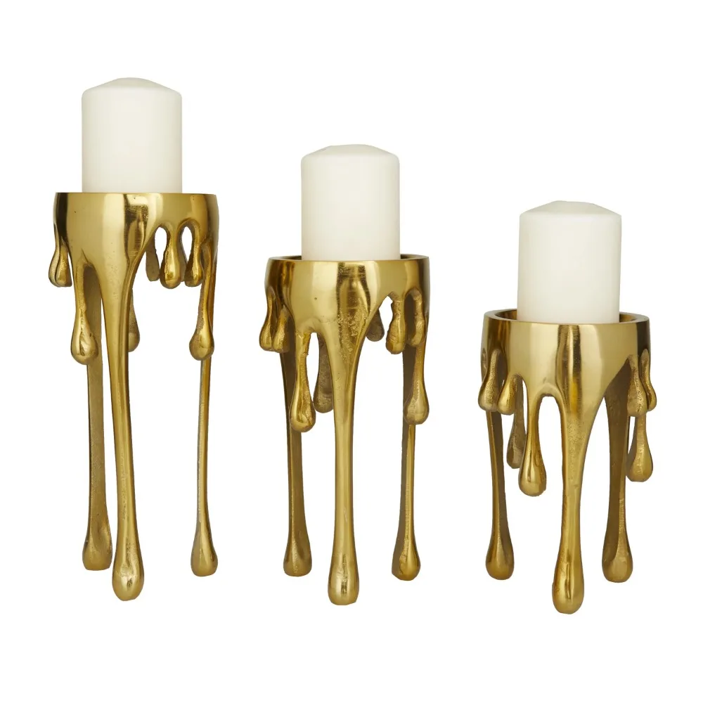 

CosmoLiving by Cosmopolitan 3 Candle Gold Aluminum Abstract Pillar Drip Candle Holder, Set of 3