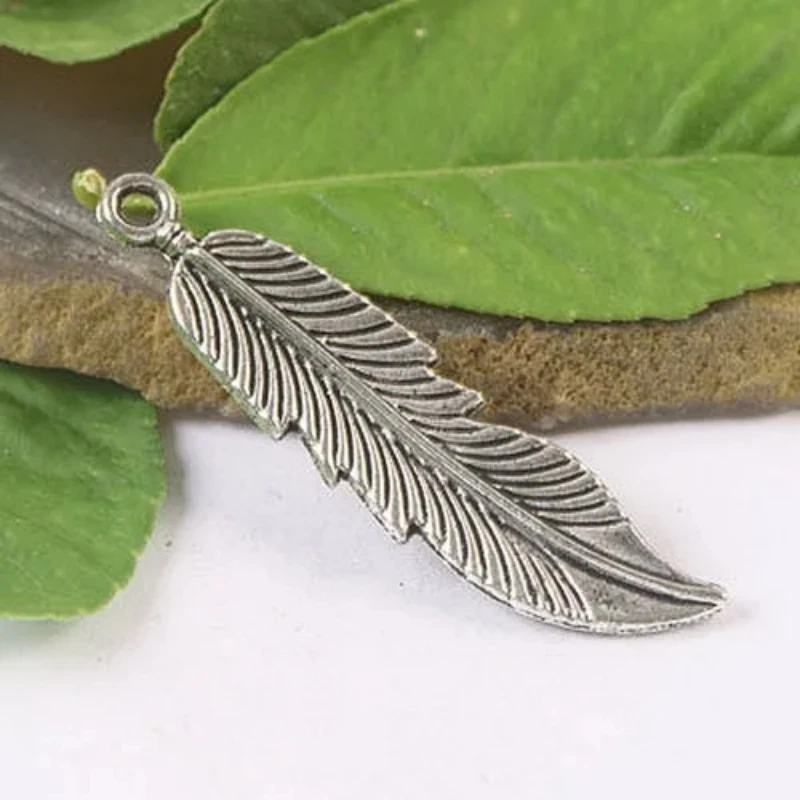 

20pcs 45x1 0mm Тибетский серебристый цвет 2side feather charms h1118