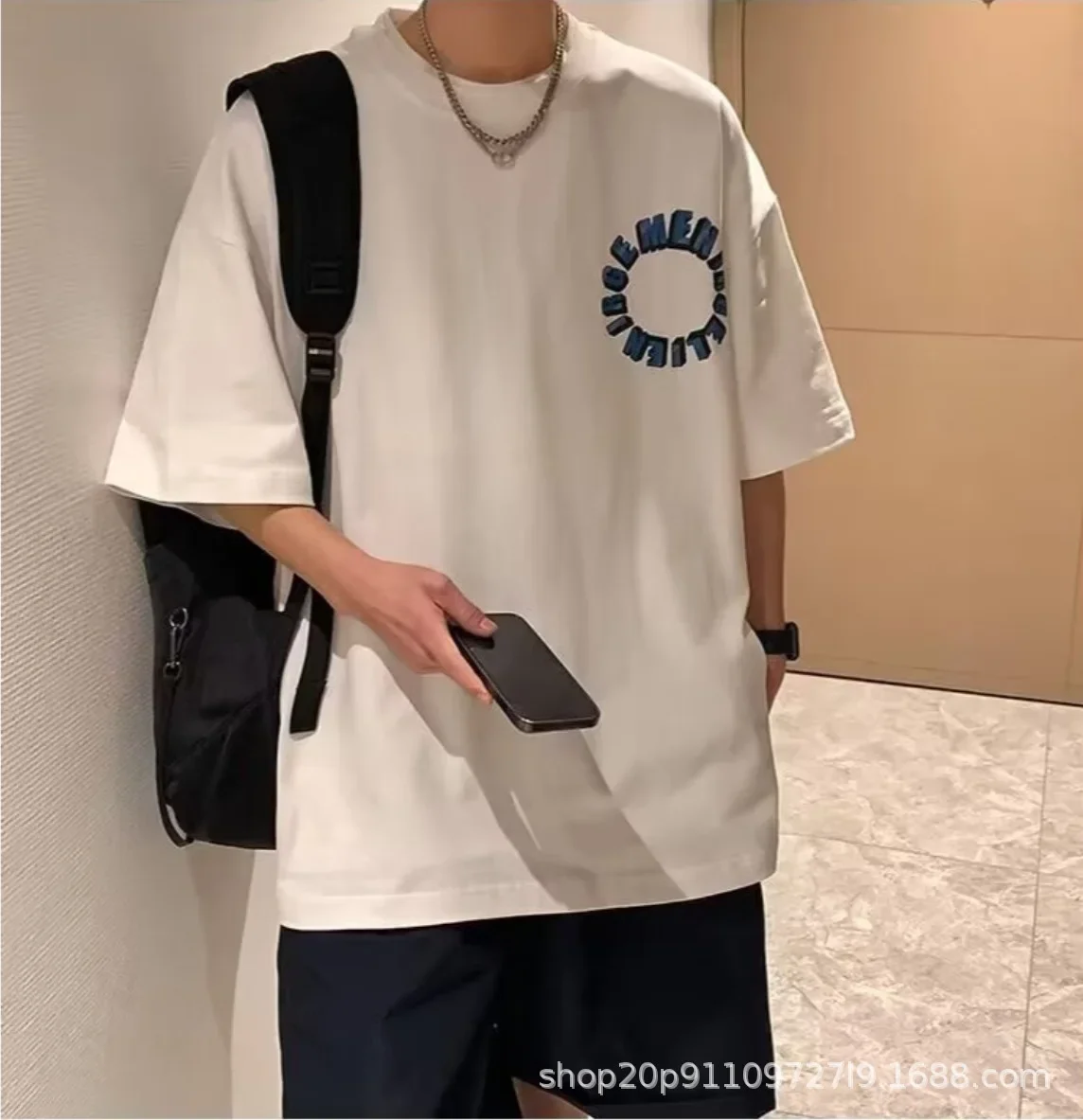 فضفاض عصري قصير الأكمام الرجال تي شيرت تنفس الكرتون طباعة الصيف أزياء عارضة أعلى نصف كم هونغ كونغ نمط المحملة