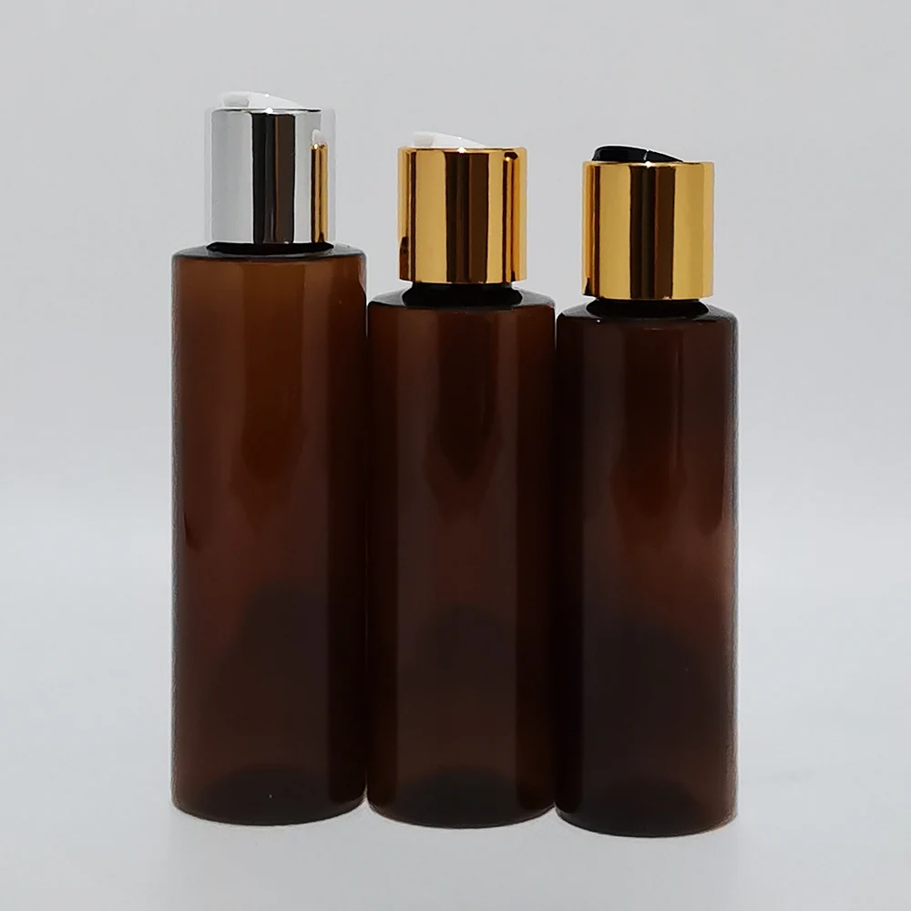 

100ml 120ml 150ml Empty PET Travel Bottle With Gold Silver Disc Top Cap Press Family Oil DIY SPA Shower Gel Cosmetic Packaging