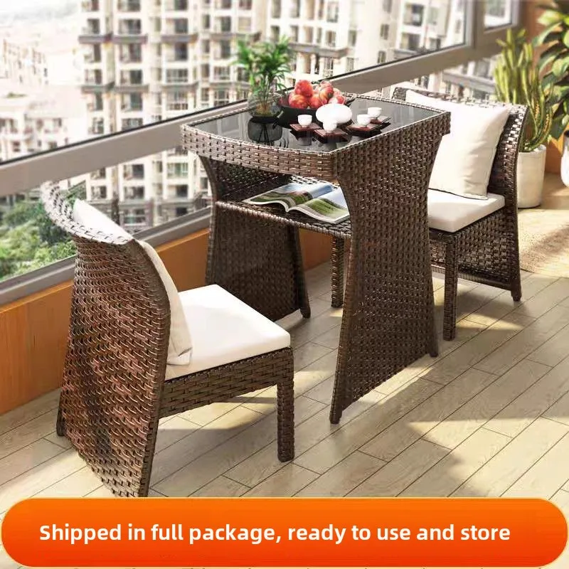 Balcony courtyard leisure table and chair combination rattan chair three piece set tea imitation rattan tea table