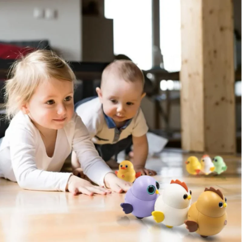 

6pcs set Cute Swinging Magnetic Electronic Pets Walking Chicken Toys For Girls Chicks Set Children Link Trackless Road Condition