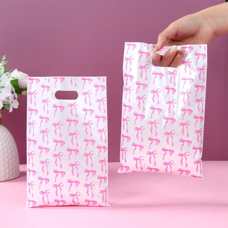 10/25/50 Stück süße rosa Schleife Kunststoff Geschenkverpackung Tasche Süßigkeiten Kuchen Snack Beutel Tasche für Kinder Mädchen Geburtstag Babyparty Hochzeit Party – Detail 1