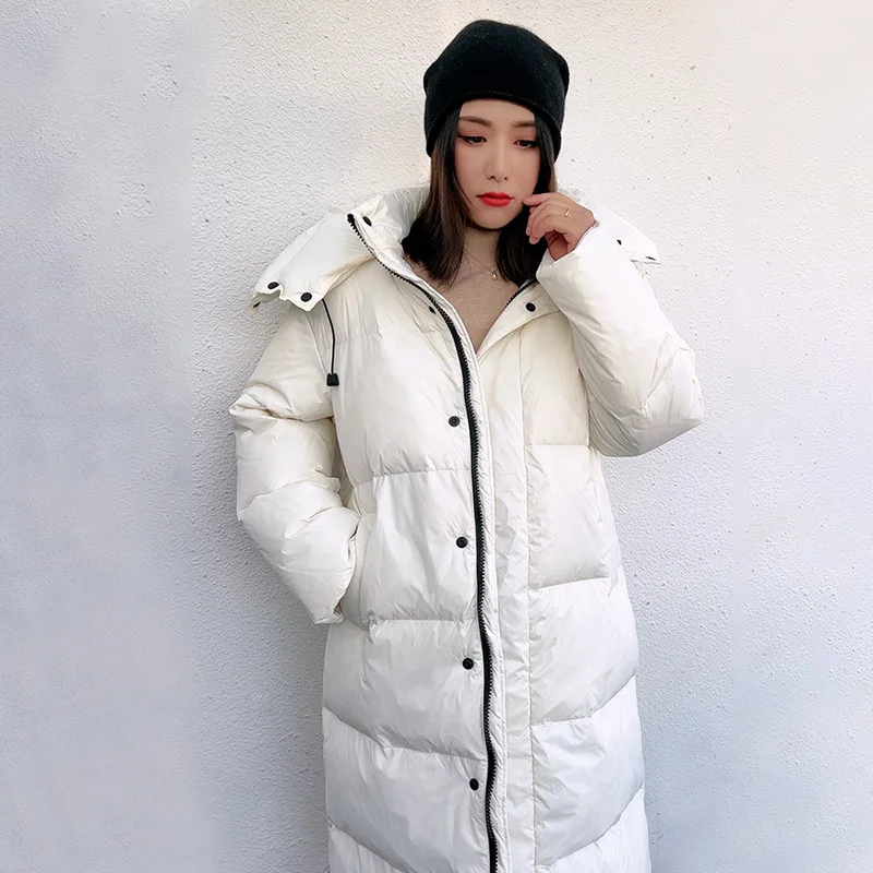 Long length large size down jacket women's new winter fashion version of loose and thick warm hooded white duck  down coat